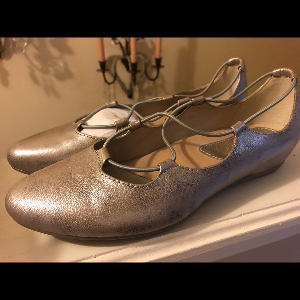 Earthies leather slip on flats, silver tone.